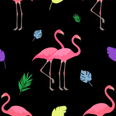 Seamless vector pattern with pink flamingo and tropical leaves on a black background