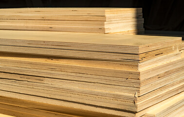 sawn plywood on a black background