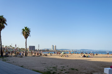 A view of the Barcelona coastline from the Passeig del Mare Nostrum, a street that runs along the beach.