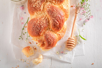 Homemade golden challah baked in a home bakery.