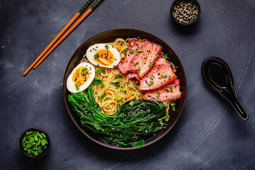 Traditional ramen noodle soup with brisket, spinach and egg.