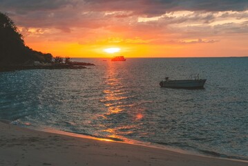 Sunset atmosphere by the sea by the sea, white sand beach, beautiful romantic view at Koh mun nork ,Thailand