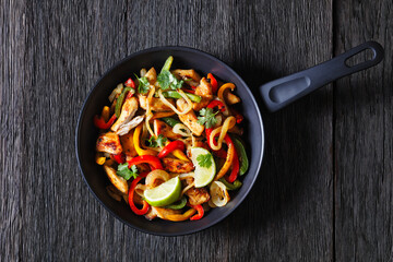 chicken fajitas with bell peppers, onion, spices