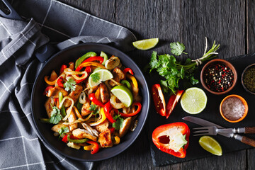 chicken fajitas with bell peppers, onion, spices