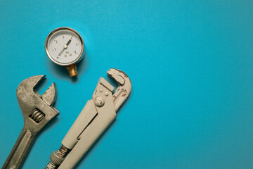 Pressure gauge, measuring instrument close up on pneumatic or hydraulic control system. Plumbing...