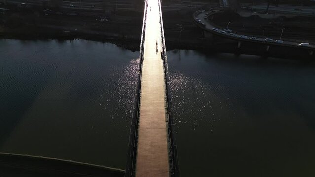 Aerial video of the high bridge walkway, which crosses the Harlem River in New York during sunset