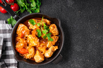 chicken meat tomato sauce vegetable Chashushuli meal food snack on the table copy space food background rustic top view