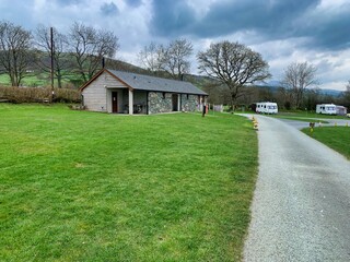 Obraz premium campsite reception stone built building 