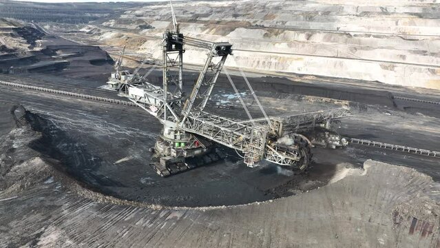Browncoal mine machine, large excavator in action.