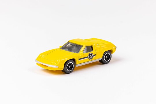 Closeup shot of a yellow Matchbox 1972 Lotus Europa Special LOTUS isolated on a white background