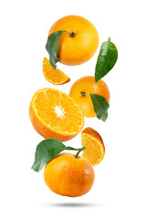 Falling ripe tangerines with leaves on a white background. Levitation or flying food concept.