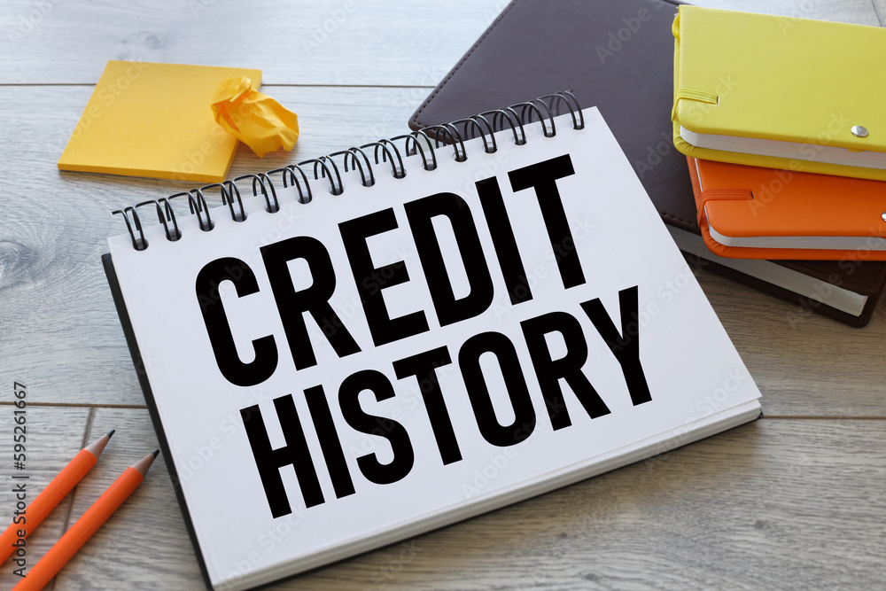 Poster credit history. text written on a notepad with a spring