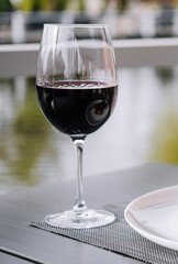 glass of wine on table close up