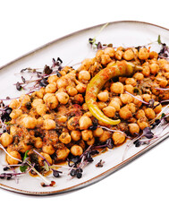 Spicy chickpea curry, chana masala or choley in plate with chapati