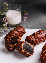 chocolate bars on plate with milk