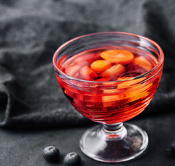 Strawberry jelly with fresh berries and peppermint