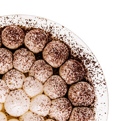 Tiramisu cake with chocolate decor isolated