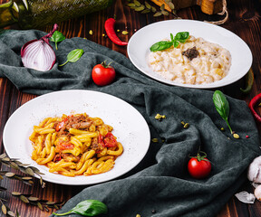 different types of italian pasta in plates