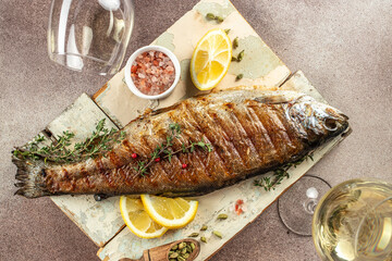 grilled trout served with white wine, Restaurant menu, dieting, cookbook recipe top view