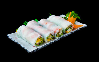 Vietnamese Pho spring roll with seafood, tofu, vegetables isolated on black background for a menu