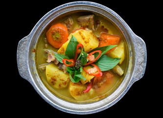 Vietnamese Bo Kho stew or potato soup with beef and carrots
