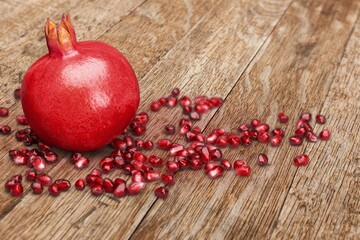 Tasty sweet Pomegranate fruit on the desk