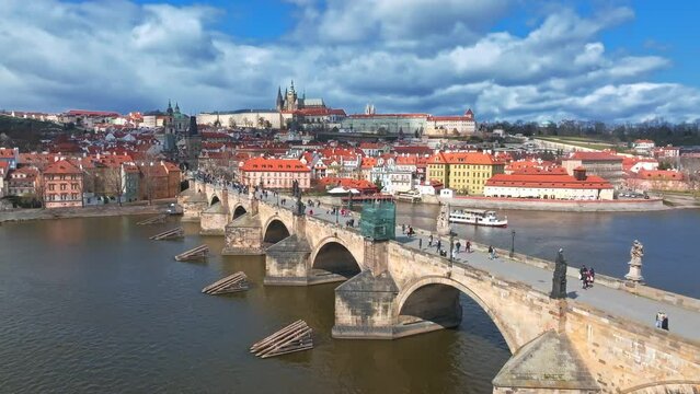 Scenic spring panoramic aerial view of the Old Town pier architecture and Charles Bridge over Vltava river in Prague, Czech Republic