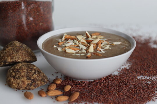 Whole ragi porridge. Whole grain finger millet porridge sweetened with jaggery