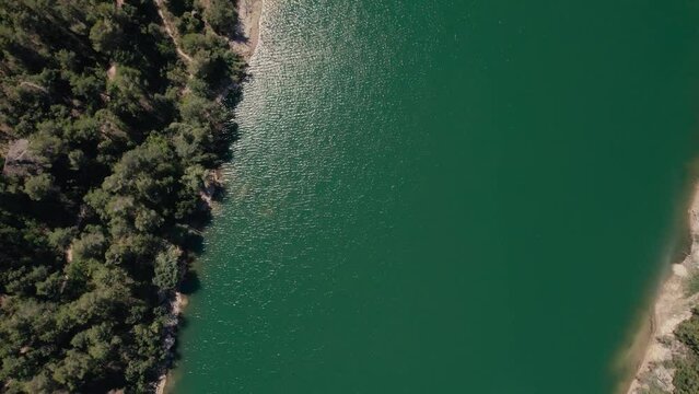 Over a river and a dam in Catalonia drone footage