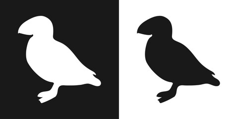 Vector set of decorative, detailed, isolated puffin penguins in black on a white background