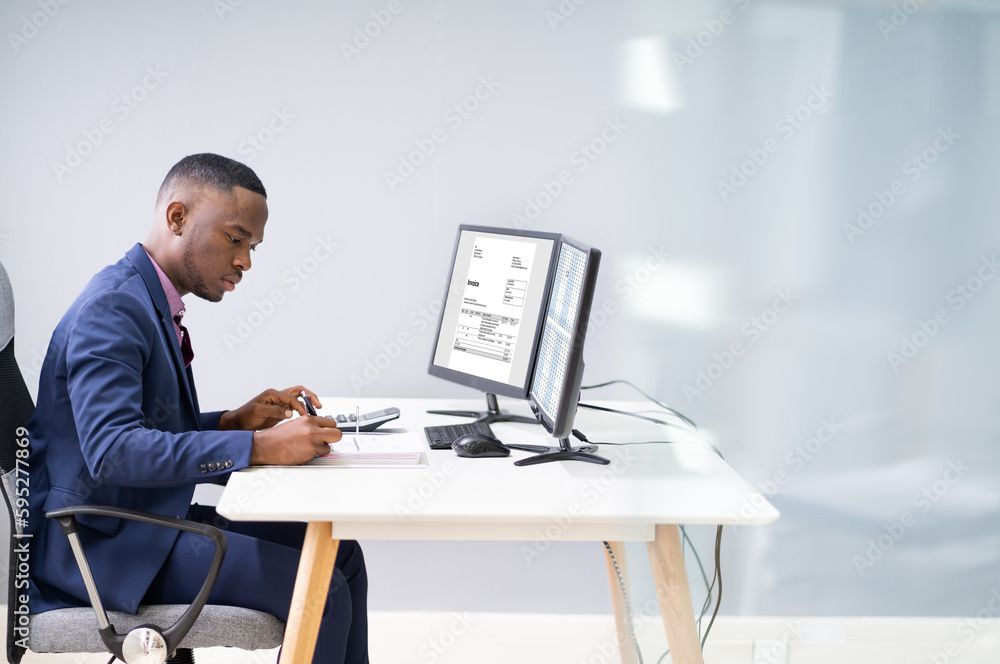 Poster businessman looking at invoice on computer