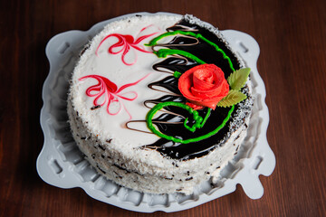 Biscuit baked cake with cream. Pastry.