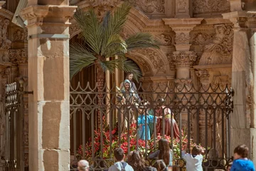 Keuken foto achterwand Historisch monument The sculptures of a nativity scene behind a fence in Astorga, Spain during holy week