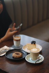 latte art on te wood table in the coffee shop