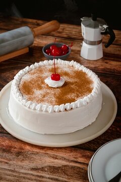 Naklejka Delicious tres leches cake on a wooden table