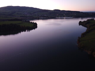 evening mood on the lake gruyere switzerland