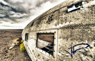 Wreckage of an old airplane abandoned on a beach