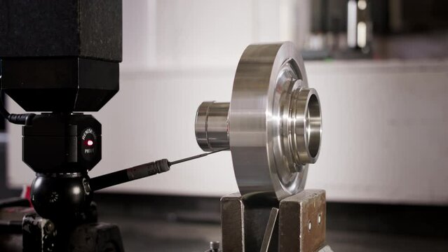 Close up of coordinate measurement machine CMM for high precision part inspection during production