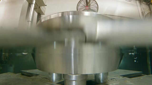 Underwater footage of ultrasonic inspection of jet engine parts during production