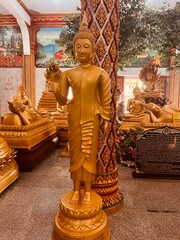 Buddhist temple and sculptures of monks on the island of Thailand