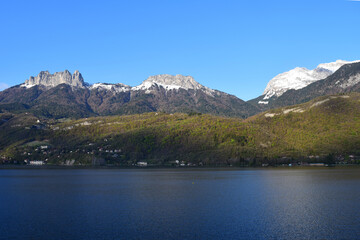 Annecy lake and mountains landscape in savoy, france