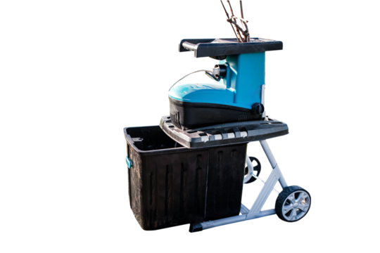 Isolate shredded branches and vines in a container electric garden grinder to shred, a tool for cutting wood waste and pruning and tidying up your garden on a white background