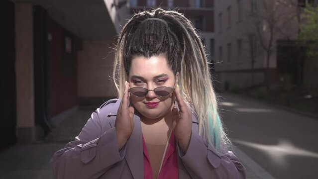 Multicolored dreadlocks on a woman