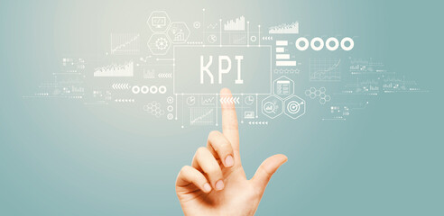 Fototapeta premium KPI - Key Performance Indicator theme with hand pressing a button on a technology screen
