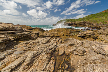 Bucolic landscape with beach on a cloudy day in the touristic city of Armação dos Buzios, coastline of Rio de Janeiro, Brazil.