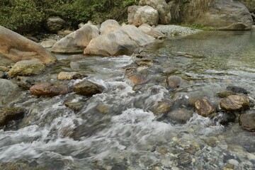 fast flowing water through the rocks
