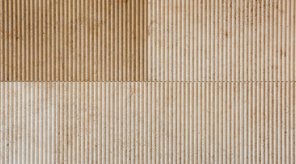texture of a tiled beige stone wall with a Vertical joint pattern as background, natural stone wall texture as background. Close-up of a wall clad in limestone
