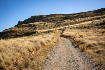 a gravel road going up to the Fortress of Santa Engracia in Pancorbo, comarca Valle del Ebro, province of Burgos, Castile and Leon, Spain