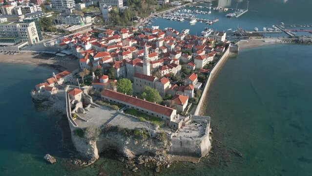 The old town of Budva shot from a drone. The best sights of Montenegro. Budva Old Town fantastic footage. Aerial view.