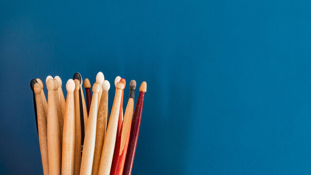 Group of drumsticks close up view. International drum month concept. Copy space for text.